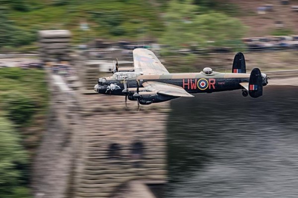  BBMF Lancaster passing the towers of the Derwent Reservoir, re-enacting the training maneuvers required for Operation Chastise, earlier this year. ( Image Credit: Air Team Canon)
